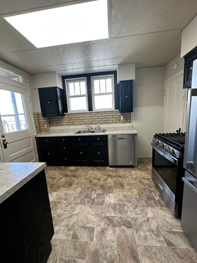 Building Photo - WESTWOOD - Charming 3bd Tudor w modern upd...