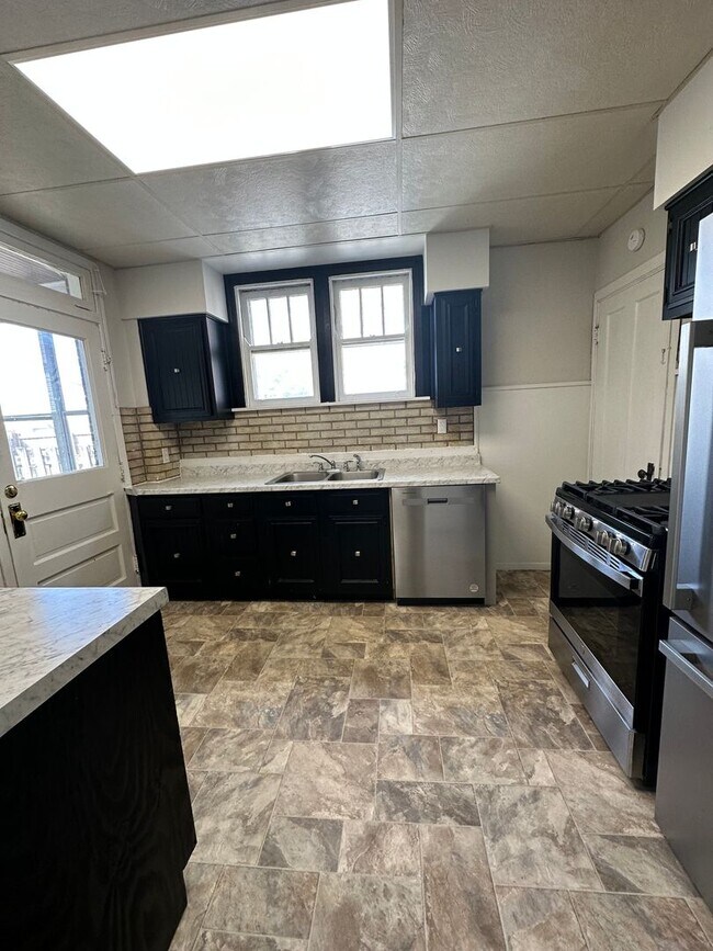 Building Photo - WESTWOOD - Charming 3bd Tudor w modern updates