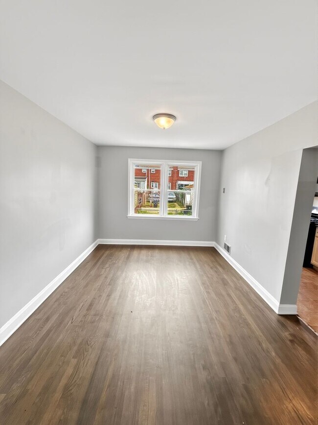 Building Photo - Spacious Dundalk Home with Finished Basement & Fireplace