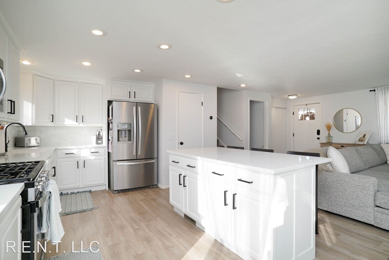 Foto principal - 4 br, 2 bath House - 52 East 125 South