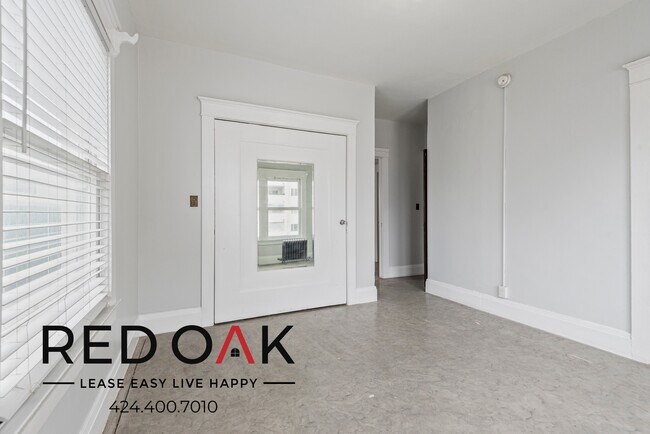 Foto del edificio - ~1 Month FREE~ Elegant One-Bedroom with Lo...