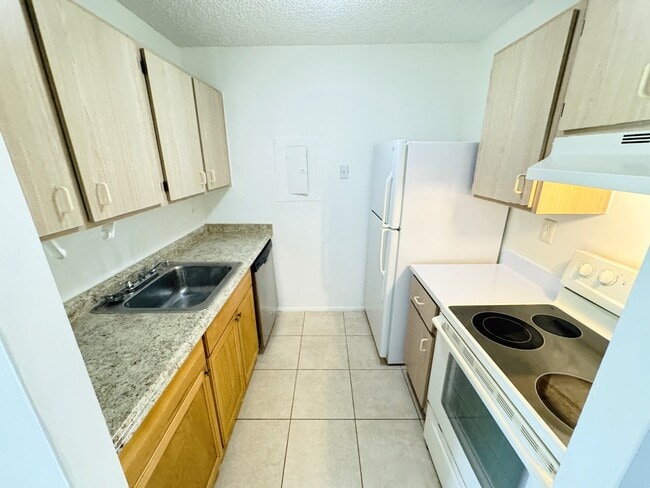 Photo - 1101 Benoist Farms Rd Townhome