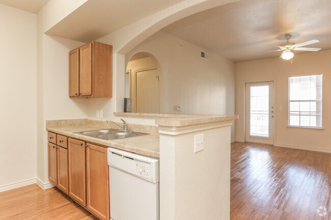 2HAB, 2BA - 989 ft² - Cocina y sala de estar - Woodlawn Ranch Apartments