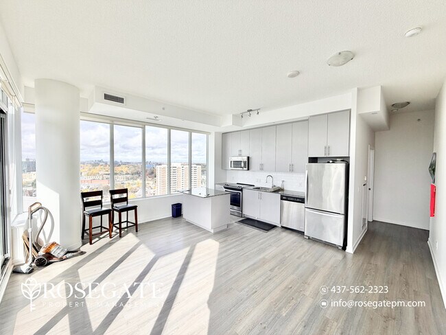 Photo du bâtiment - Modern 2-Bedroom Condo with Balcony & Park...