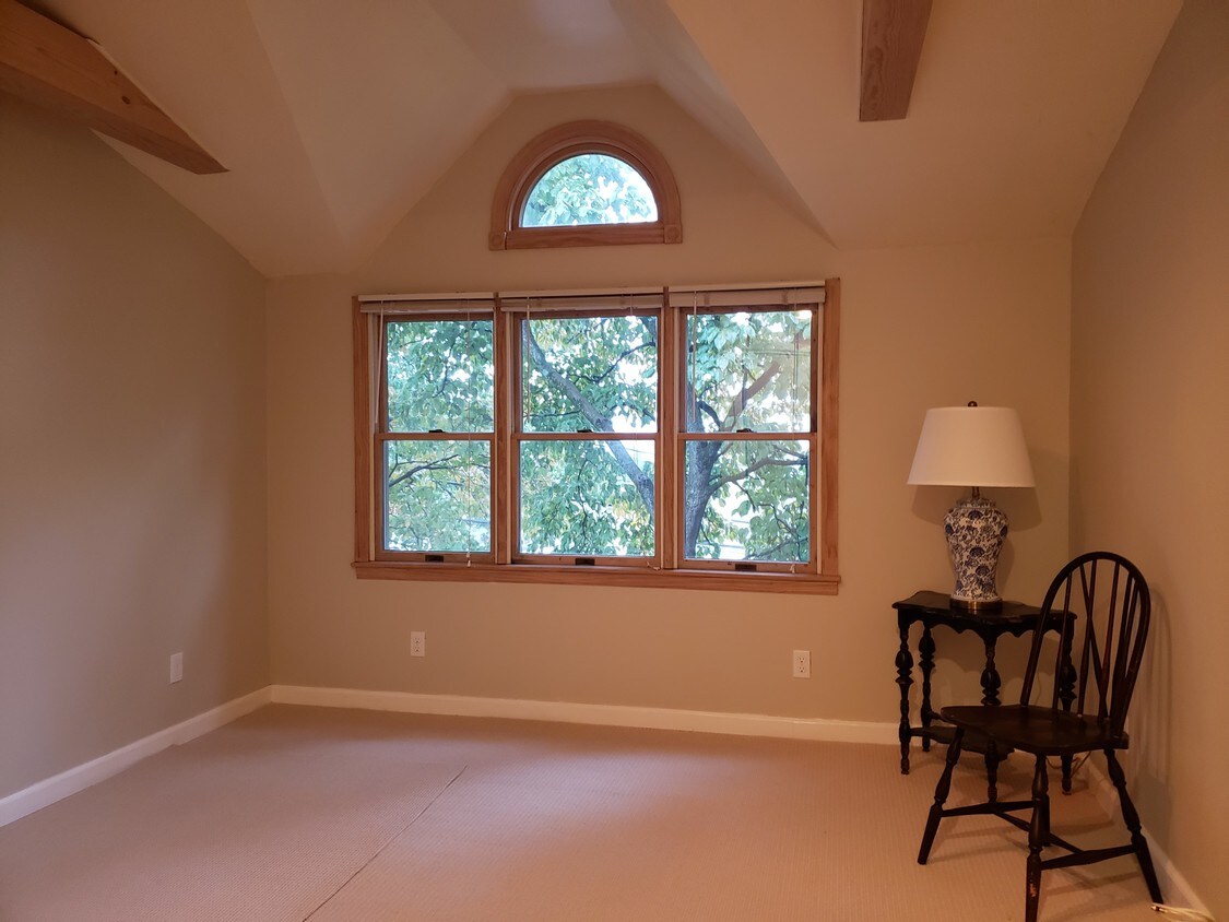 living room w/ cathedral ceiling - 42 Carlisle Pl