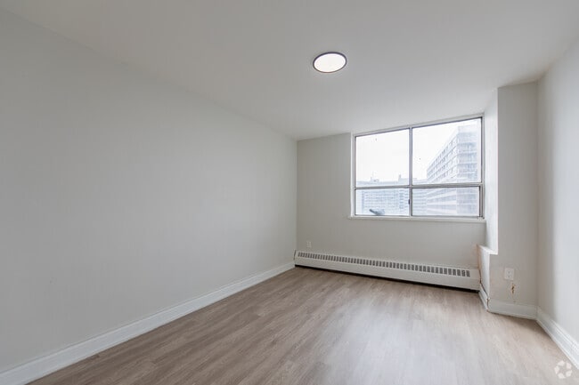 1 chambre, 1 salle de bain - 850 pi² - Chambre - Centennial Towers