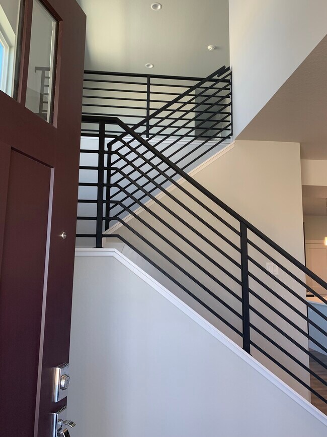 Escaleras que suben - 2801 E 102nd Plz