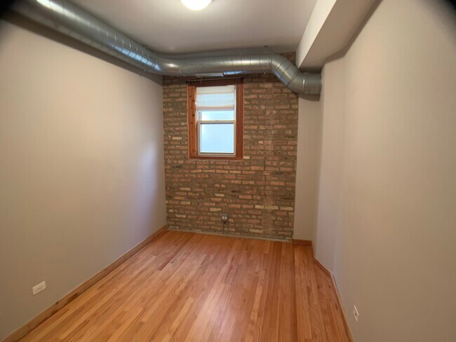 Building Photo - 1651 W Pratt Blvd