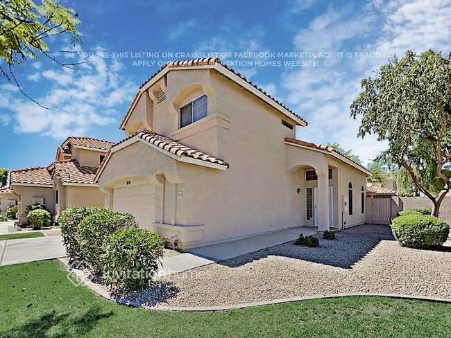 Building Photo - 8030 W Paradise Dr