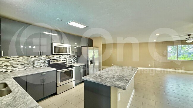 Building Photo - 1320 E Orchid Ln