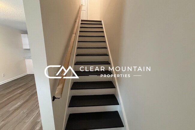 Building Photo - Downtown Greer Living! Renovated 2BR Townhome with Modern Finishes