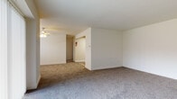 Located at 3404 Knights Rd in Bensalem, PA, this single-floor unit offers a practical and comfortable layout with a variety of well-appointed spaces. The living area is generously sized, featuring neutral wall-to-wall carpeting and a ceiling fan, with large sliding glass doors and windows that invite an abundance of natural light throughout the day. The open flow between the main living space and adjoining areas provides a sense of openness and ease of movement.

The kitchen is thoughtfully designed with rich, dark cabinetry, light stone-toned countertops, a mosaic tile backsplash, and wood-look flooring. Black appliances, including a range, dishwasher, and range hood, complete the functional cooking space.

The bathroom is finished with warm earth-toned floor and wall tiles, a soaking tub with a full tile surround, a white vanity with storage, and clean, neutral walls — providing a calm, utilitarian retreat.

The bedrooms are carpeted and bathed in natural light from windows with blinds, offering quiet, comfortable spaces. Clean white walls and neutral tones throughout the unit create a cohesive and move-in-ready environment, well-suited for everyday living.