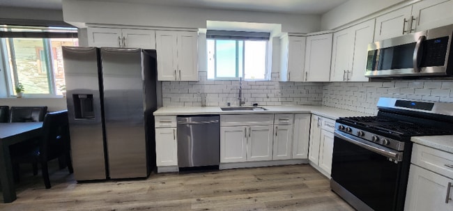 Photo - 4651 W 18th St Townhome