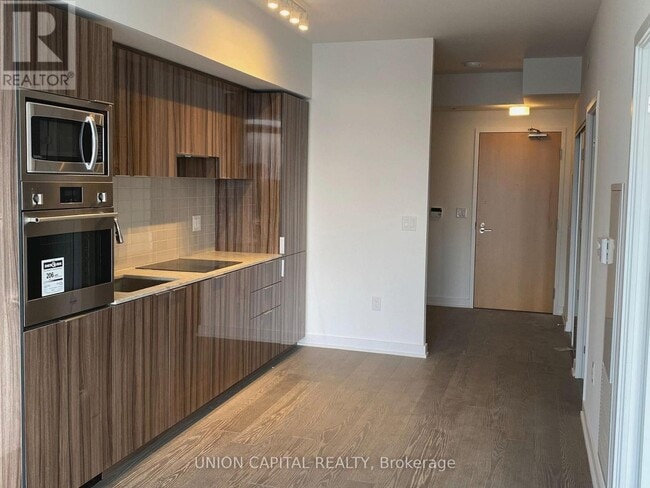 Building Photo - 11 Wellesley St W