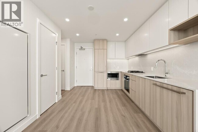 Photo du bâtiment - 6087 Wilson Ave