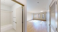 Located at 161 S Huntington Ave in the Jamaica Plain neighborhood of Boston, MA, this thoughtfully designed unit offers a well-organized single-floor layout comprising a combined kitchen and living area along with a full bathroom. Light-toned hardwood flooring flows throughout the space, lending warmth and visual continuity, while large windows along one wall invite generous amounts of natural light and offer views of surrounding tree canopy.

The open-concept kitchen and living area serves as the heart of the unit. The kitchen is outfitted with crisp white shaker cabinetry extending to the ceiling, providing ample storage. Granite countertops with a subtle speckled pattern complement the stainless steel appliances, which include a range, microwave, dishwasher, and refrigerator. The living area is bright and open, with clean white walls and sun-dappled floors that create a calm, airy atmosphere.

The bathroom is finished in a clean, modern style featuring subway tile surrounding the bathtub and shower, a white vanity with an undermount sink, a large mirror with overhead lighting, and chrome fixtures throughout. Additional features visible in the unit include closet space and a utility panel, enhancing everyday functionality. The overall aesthetic is minimal, clean, and well-maintained.