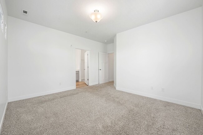 Building Photo - Modern Herriman Condo with Stylish Living & Community Amenities!