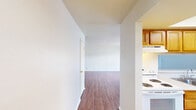 Step into a world of endless possibilities in this beautifully designed 2-bedroom, 1-bathroom apartment. The moment you enter, you're greeted by a sense of openness and light, with gleaming hardwood floors stretching throughout the 850 square feet of living space. The heart of this home is the expansive kitchen and living area, where memories are waiting to be made. The kitchen, adorned with warm wood cabinetry and modern appliances, inspires culinary creativity while the living room's sliding glass doors invite the outdoors in, perfect for entertaining or peaceful relaxation.

The primary bedroom, a generous 160 square feet, offers a private retreat with ample closet space for all your belongings. Large windows in both bedrooms frame picturesque views, filling the rooms with natural light and creating an uplifting atmosphere. The bathroom, pristine and inviting, features a sleek design that combines functionality with style.

This home is more than just a space; it's a lifestyle. Whether you're a young professional seeking a stylish abode, a small family looking for a cozy nest, or anyone in between, this apartment adapts to your needs. The efficient layout maximizes every square foot, ensuring no space is wasted. With its modern amenities and timeless charm, this home offers the perfect balance of comfort and sophistication. Don't just imagine your dream life – live it in this exceptional property that's ready to become your personal haven.