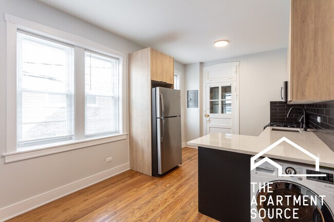 Foto del edificio - 4011 N Lowell Ave