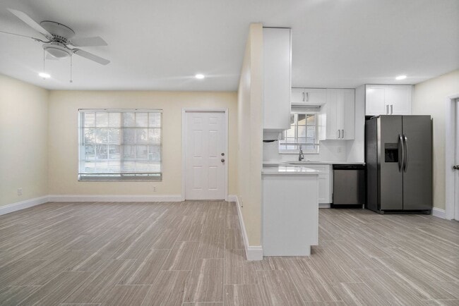 Building Photo - ANNUAL RENTAL - 2 Bedroom, 1 Bath w/ Garag...