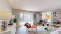 Located at 950 W Floral Dr in Monterey Park, CA, this single-story residence offers a well-organized layout with light-filled living spaces and consistent wood-style flooring throughout. The expansive living room is a standout feature, anchored by large floor-to-ceiling vertical blinds that invite abundant natural light and provide views of the surrounding greenery. The open layout seamlessly connects the living area to the rest of the home, creating a comfortable and functional flow. A ceiling fan adds to the comfort of the space.

The galley-style kitchen is efficiently designed with white cabinetry, a mosaic tile backsplash, a gas range, and ample counter space — ideal for everyday cooking. Adjacent to the kitchen, the dining area accommodates a full-sized table and benefits from a window framing views of palm trees, adding a pleasant California ambiance.

The bedroom is generously proportioned, featuring a walk-in closet and easy access to the full bathroom. The bathroom includes a tub-shower combination with clean white tile surround. Neutral tones throughout the home provide a calm, versatile backdrop, making each room feel inviting and move-in ready.