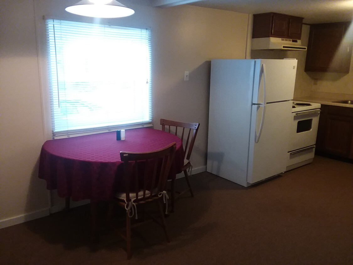 walk in to kitchen, large window to see parking lot and yard. Clean appliances - 333 Main St