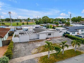 Building Photo - 6049 W 14th Ln