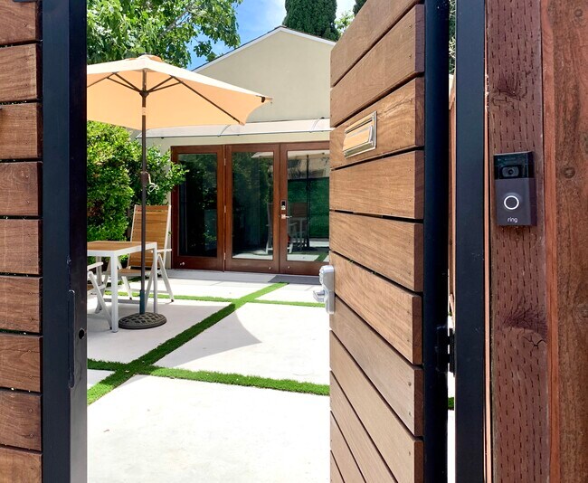 Gated private entrance with ring doorbell with custom door code - 5939 Vesper Ave