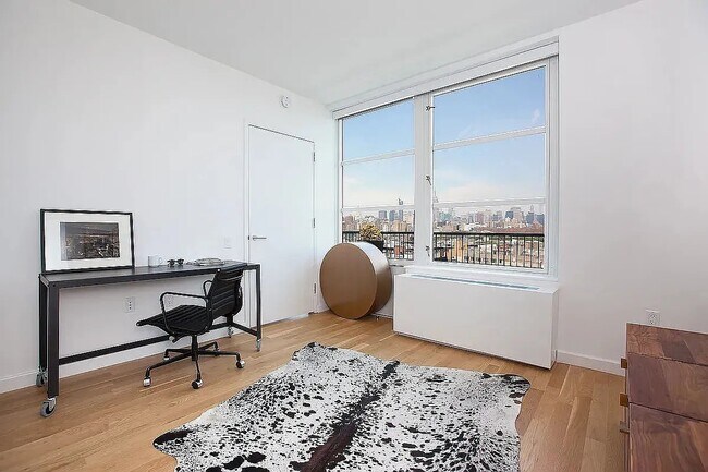 Foto del edificio - 331 E Houston St