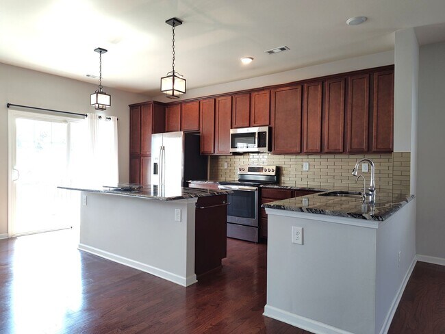 Building Photo - Charming, end-unit, townhome located in the Wrights Crossing Community!