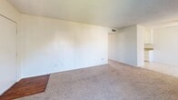 Located at 2265 Cahuilla St in Colton, CA, this single-floor residence offers a practical and well-organized layout with two bedrooms, two bathrooms, a kitchen, dining room, living room, hallway, and four closets. The living room is carpeted and features a ceiling fan, a window that brings in natural light, and a sliding glass door that opens to a private balcony with outdoor views — creating a bright, open atmosphere. The dining area connects seamlessly to the kitchen, which is equipped with white cabinetry, granite-style countertops, a double-basin sink, tile flooring, and white appliances including a range and dishwasher. A second window in the dining area adds additional natural light to this shared space. The two bedrooms are carpeted and generously sized, each featuring windows with exterior views and access to closet storage. The primary bedroom is a comfortable retreat with ample floor space. The two bathrooms are finished in clean, neutral tones — one features a walk-in shower with a sliding glass door, while the other includes a full soaking tub with a shower combination. Textured ceilings are consistent throughout the residence, contributing to a cohesive interior style.