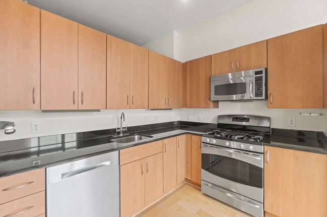Building Photo - Madrigal Lofts in Mt Vernon Triangle | 2 Bed | 2 Bath | 920 Sf | Balcony | 1 Garage Parking Space