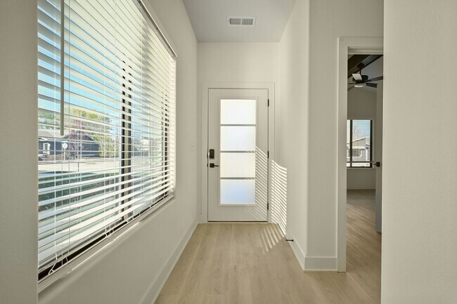 Building Photo - Stunning 2-bedroom, 2-bathroom, 2-car Town...