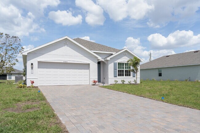 Foto del edificio - "Spacious 4-Bedroom Retreat with 2 Full Baths in Punta Gorda – Your Dream Home Awaits!"