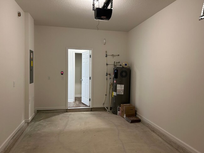 Building Photo - BRAND NEW 3/2.5 End-Unit Townhome in Orcha...