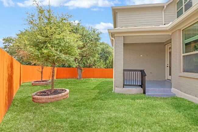 Building Photo - "Spacious 4-Bedroom Sanctuary with Cozy Fireplace in San Antonio's Prime Location!"