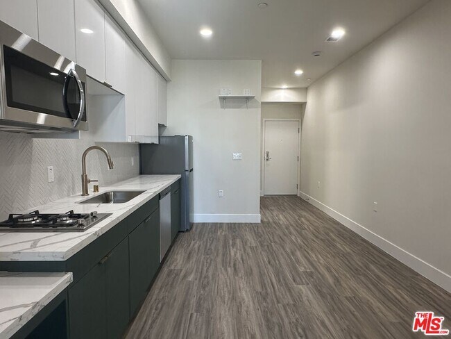 Foto del edificio - 1037 Dewey Ave
