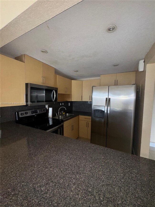 Foto del edificio - 6095 W 19th Ave