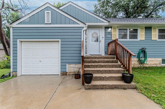 Building Photo - Back porch with a large yard!