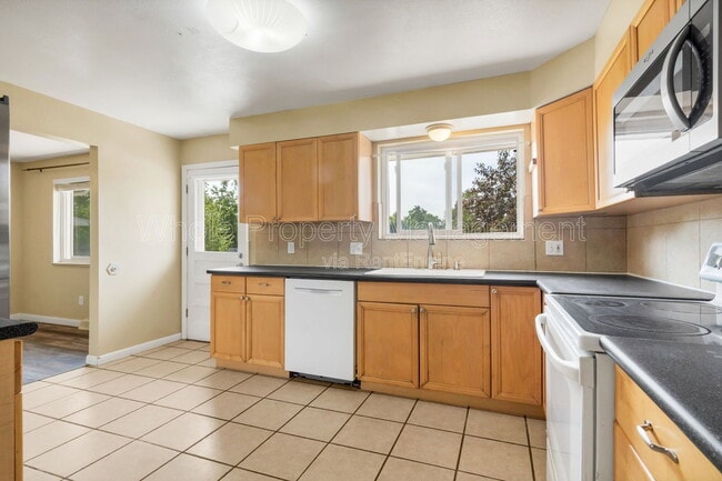 Building Photo - 6128 W 84th Ave