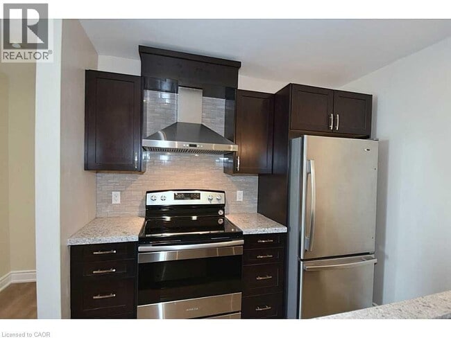 Photo du bâtiment - 1450 Glen Abbey Gate