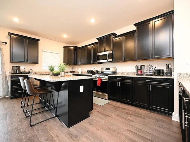 Foto del edificio - Stunning 3-Story Brick-Front Townhome | Modern Living + Military & First Responder Discount