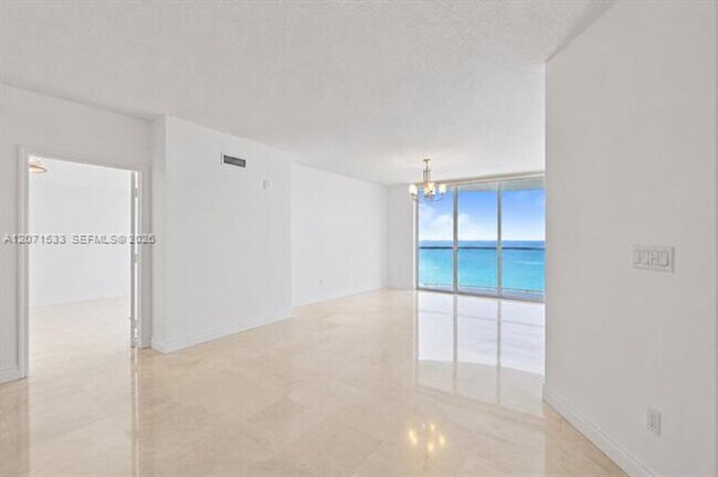 Building Photo - 16699 Collins Ave