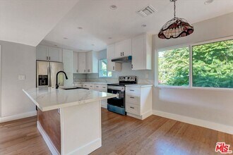 Building Photo - 5726 Woodman Ave