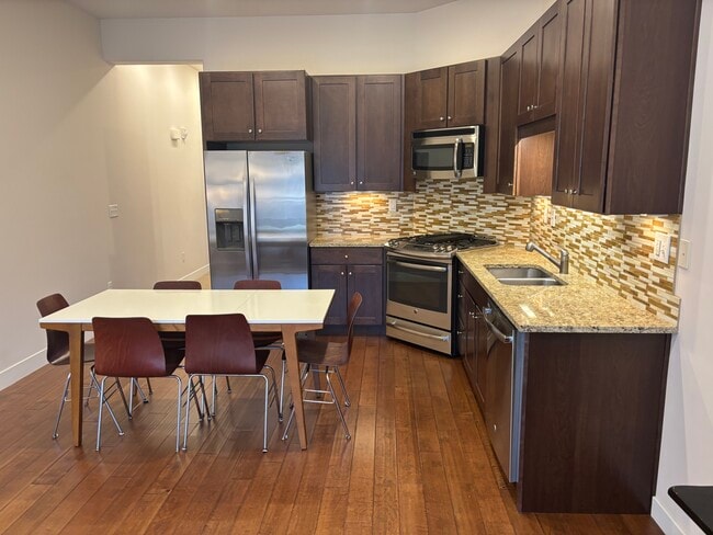 Dining and kitchen area - 6169 Park Ln S