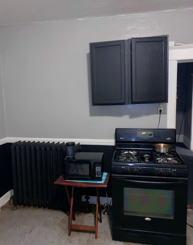 Kitchen with stove and microwave - 2503 S 11th St