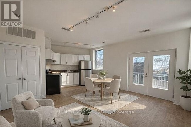 Building Photo - 3635 Dundas St W