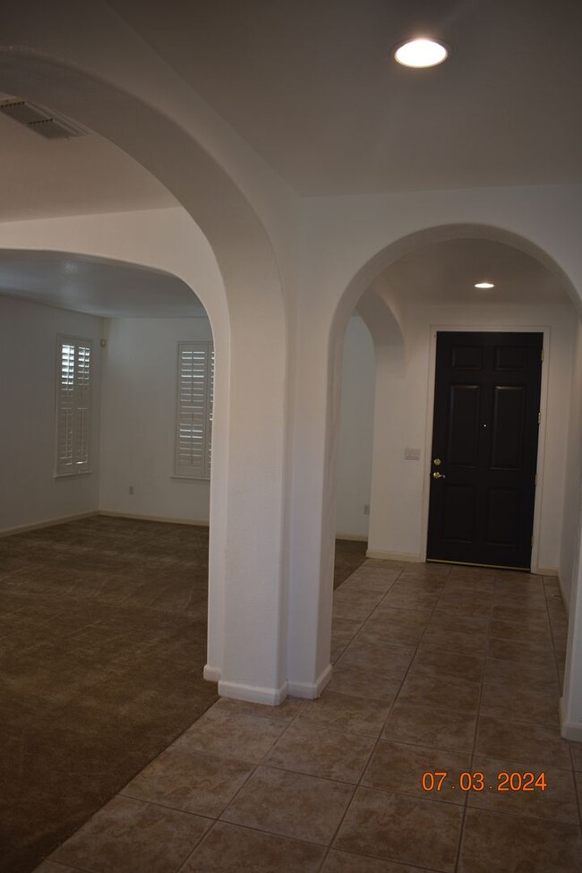 Building Photo - Gorgeous Five Bedroom Home with Four Car G...