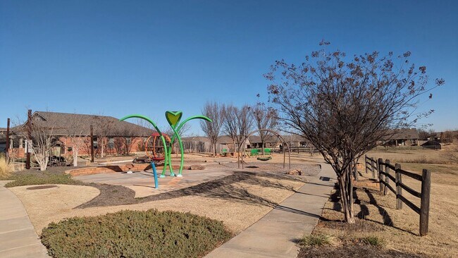 Building Photo - Modern Norman Home | Storm Shelter, Covered Patio, Community Pond & Park!