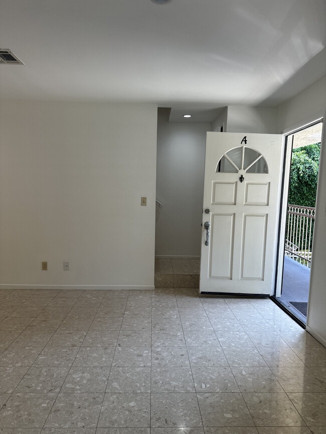 Main Entry with private balcony overlooking main street - 308 E Valencia Ave